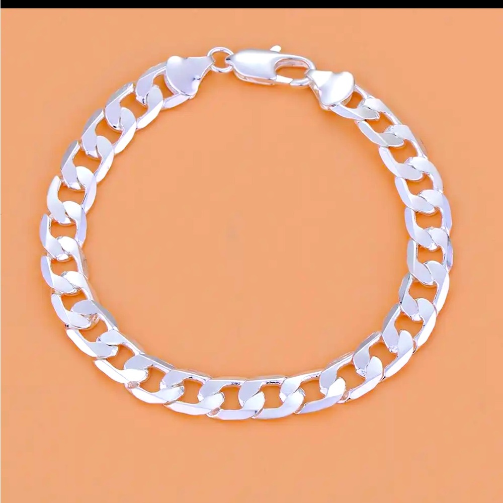 Curb Style Marked 925 Sterling Silver bracelet.
